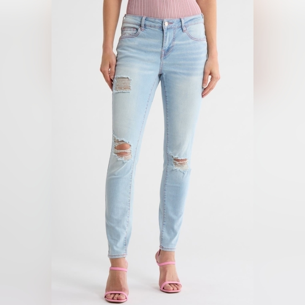 True Religion Jenni Curvy Mid Rise Jeans.